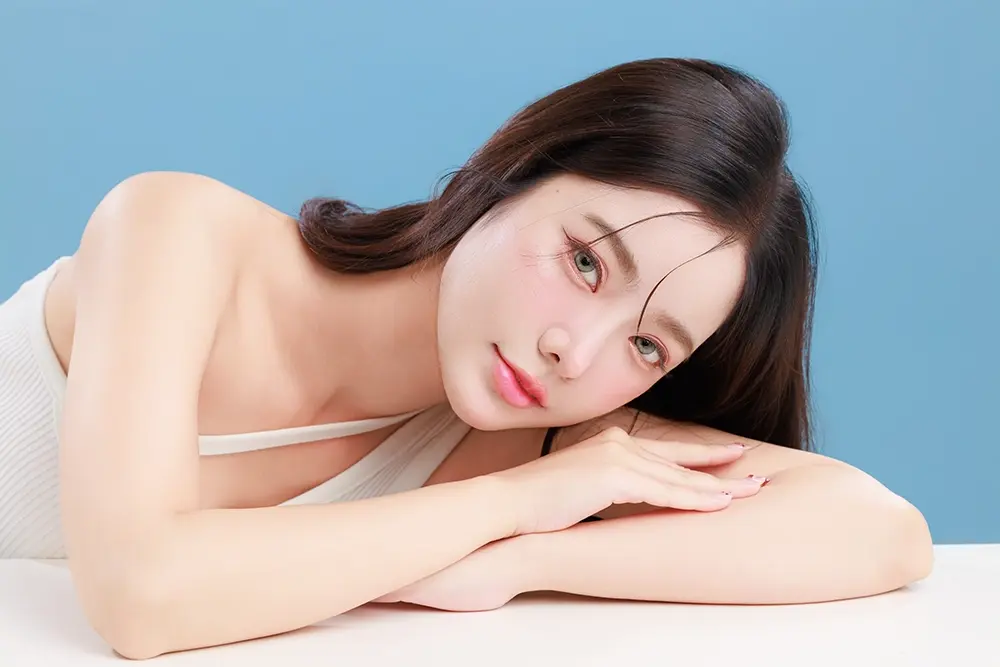 Woman with beautiful eyes after eyelid ptosis surgery.