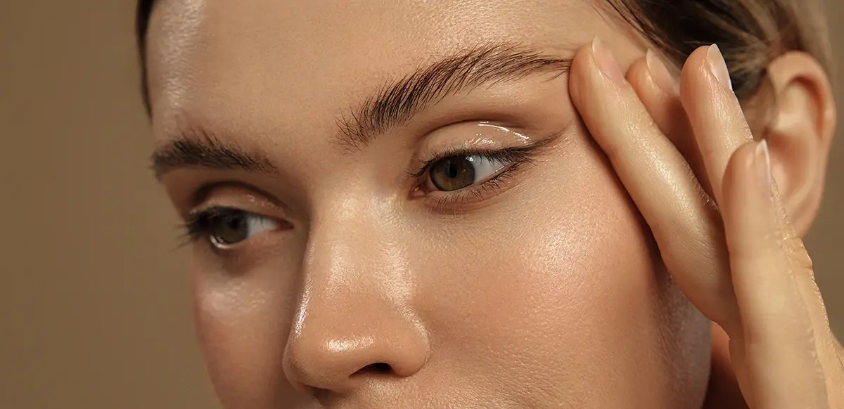 A woman with heavy eyelids contemplating upper eyelid surgery